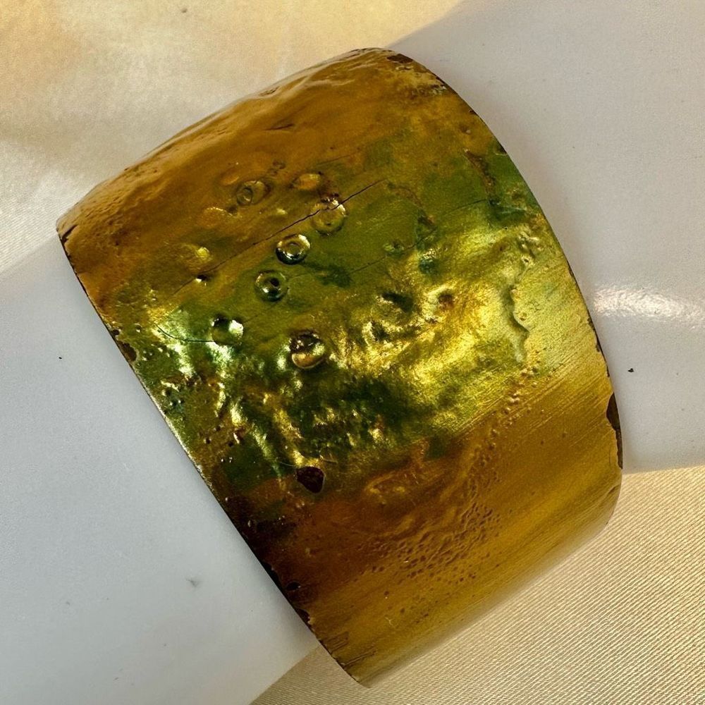 Gold tone and green cuff bracelet